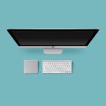 Computer setup with keyboard and trackpad.