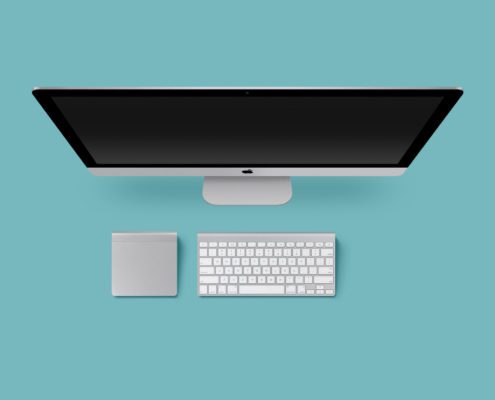 Computer setup with keyboard and trackpad.