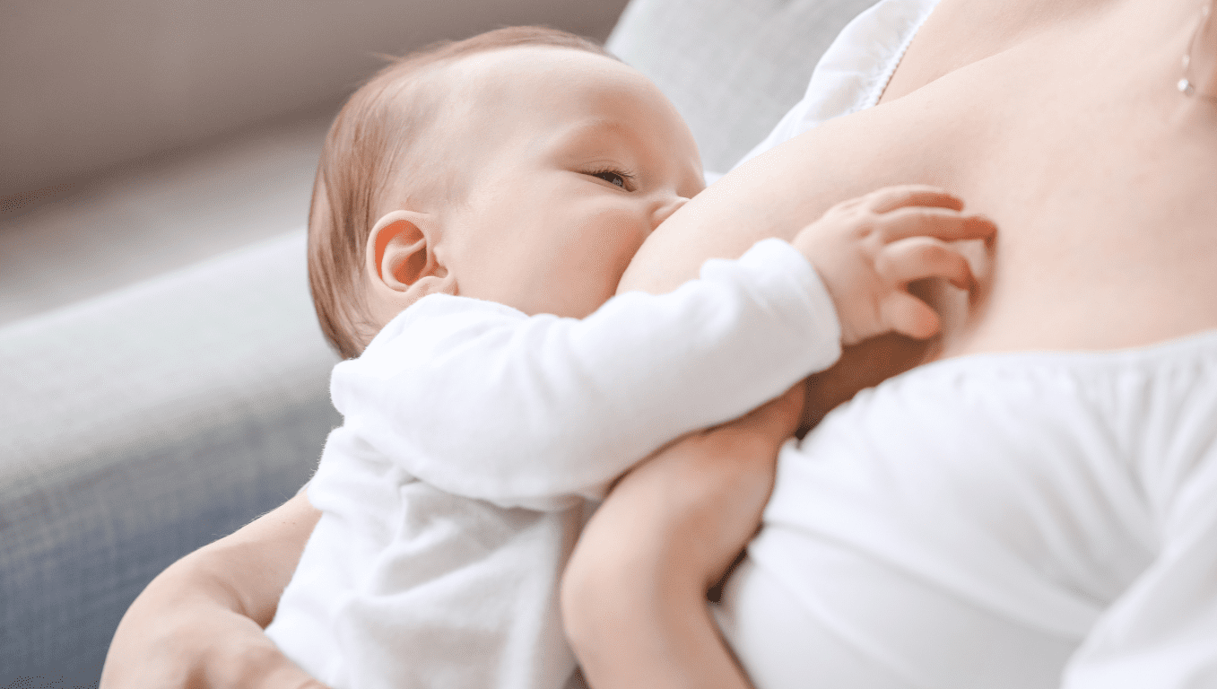 Baby breastfeeding from mother, intimate moment.