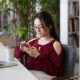 Woman using smartphone in a library.