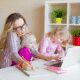 Mother multitasking with children at home.